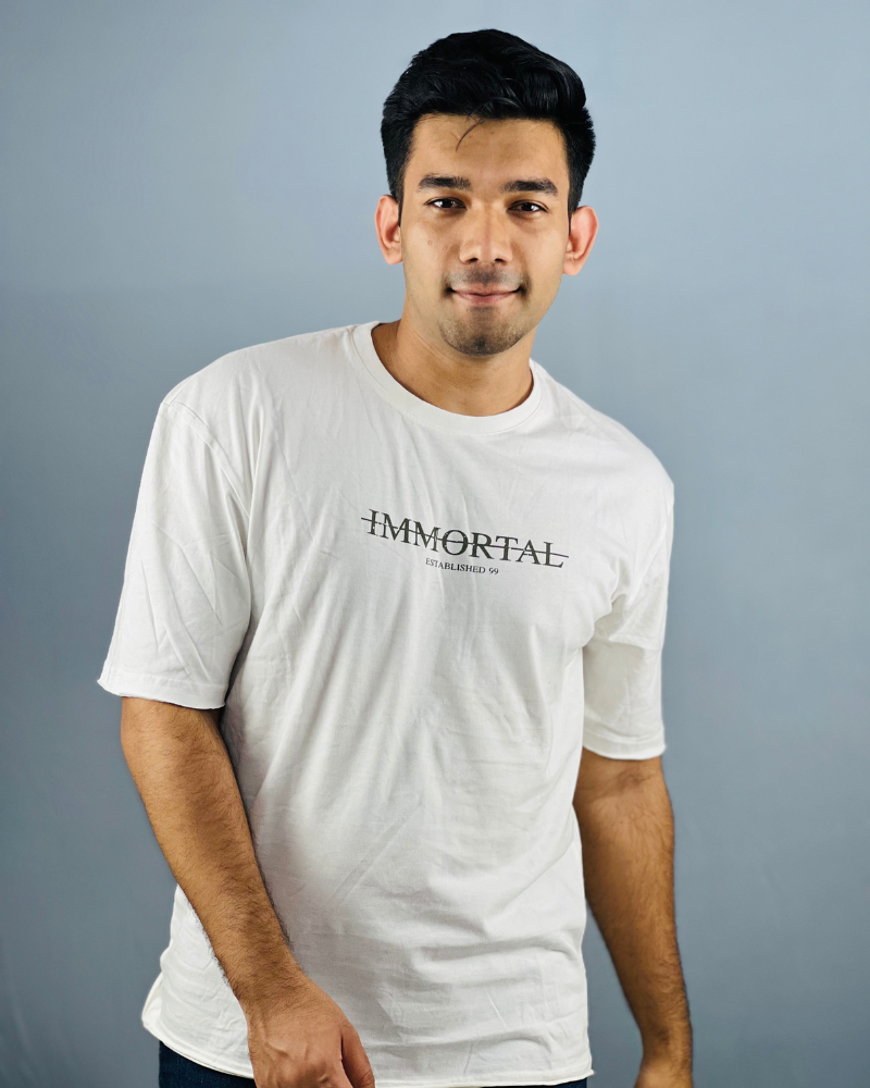 "Whispering Breeze: White Drop Shoulder Cotton T-Shirt with Printed Design"